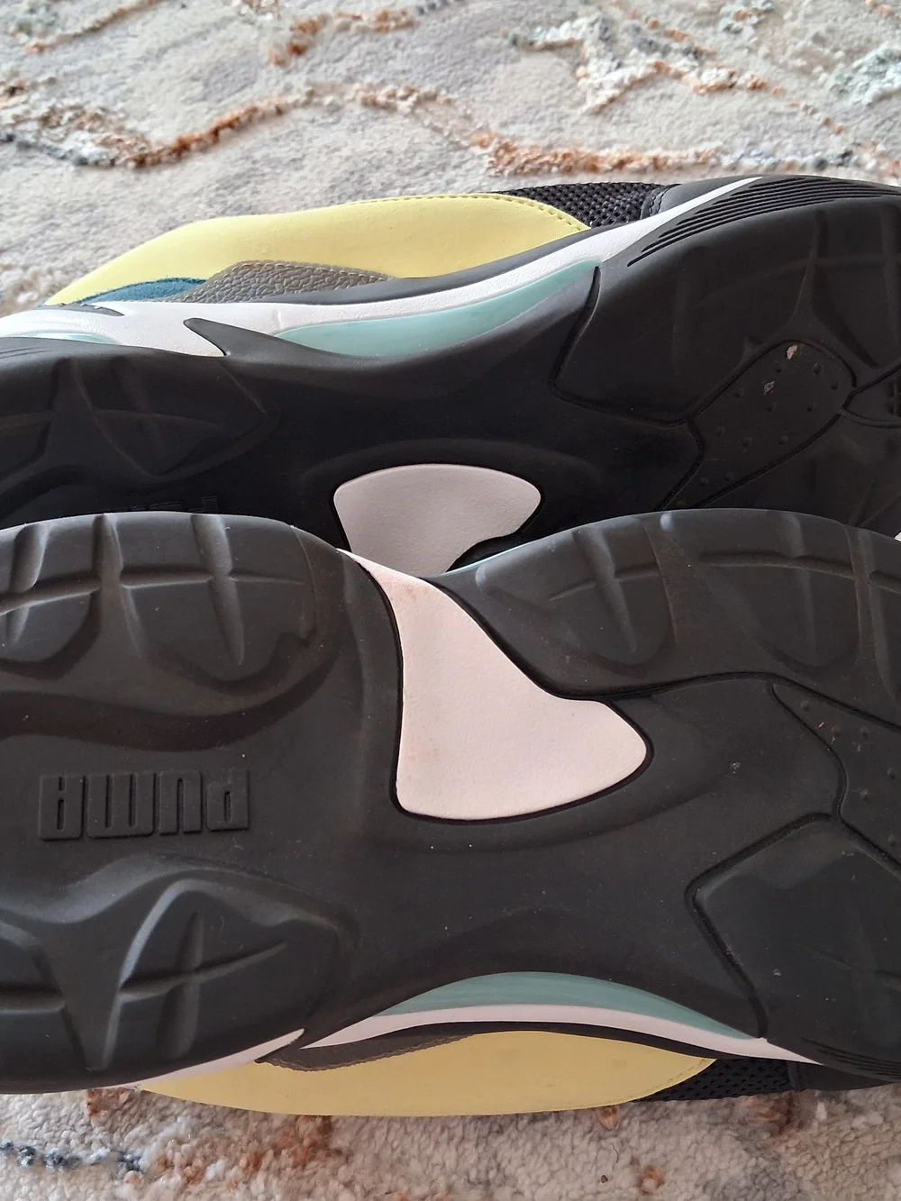 Puma Men’s Black Athletic Sneakers with Red and Yellow Accents